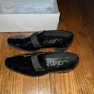 Brand new men’s Calvin Klein black leather dress shoes never worn new in box